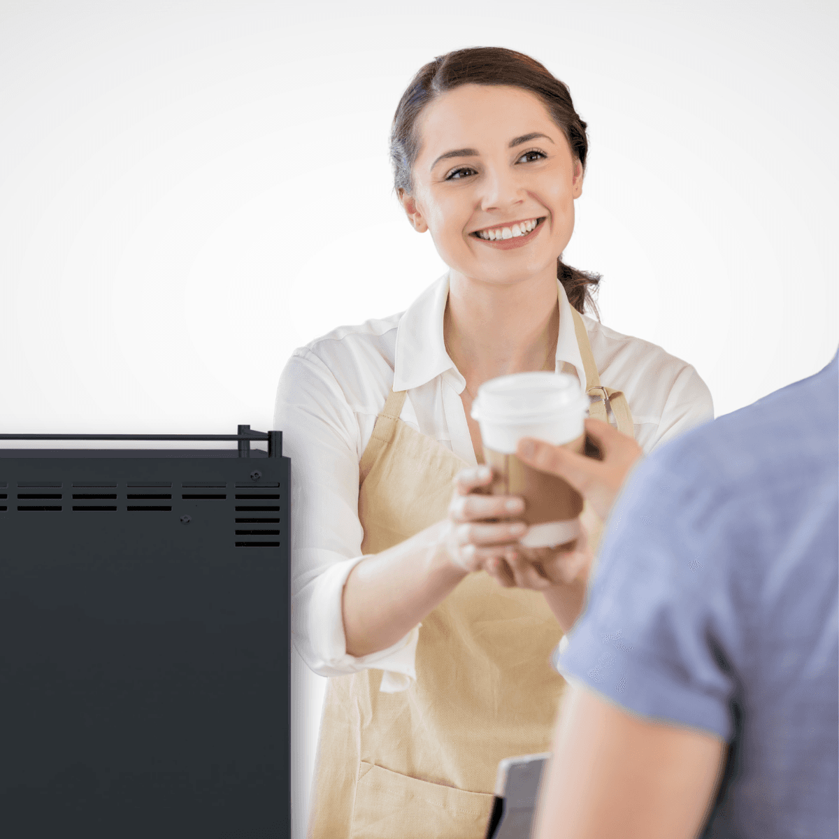 Barista handing a latte to a guest at a Beachwood event