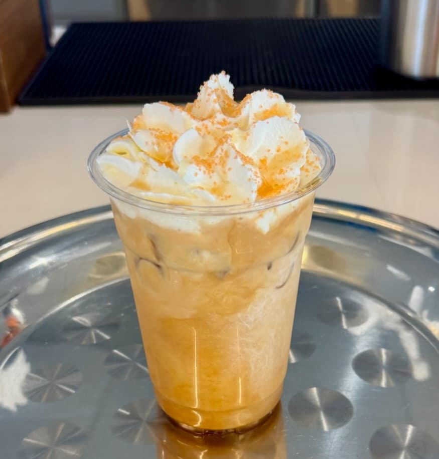 Iced latte with whipped cream served at a Pepper Pike event