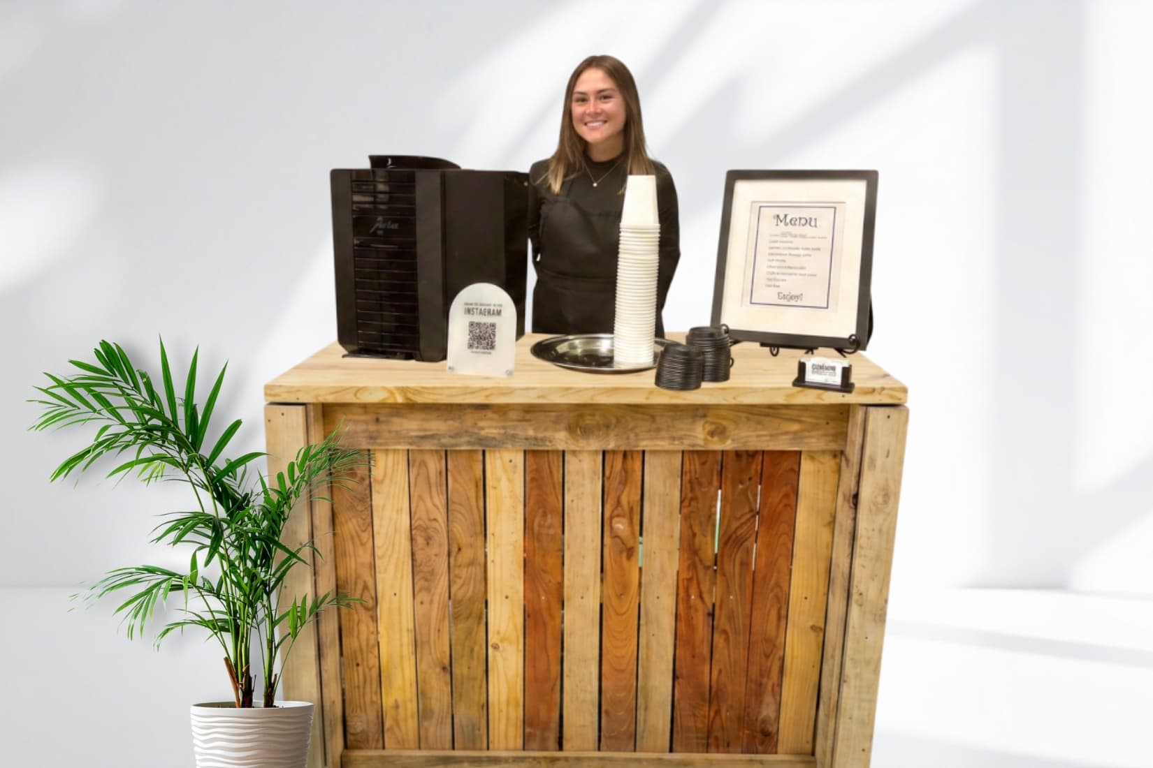 Mobile barista serving espresso from a Cleveland Espresso coffee cart at a Cleveland event