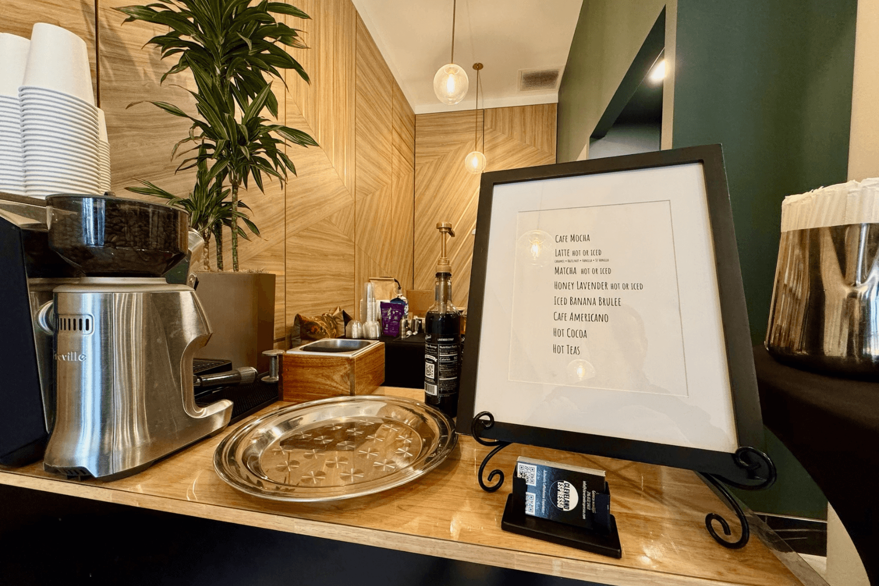 Barista station and drink menu at The May in Cleveland