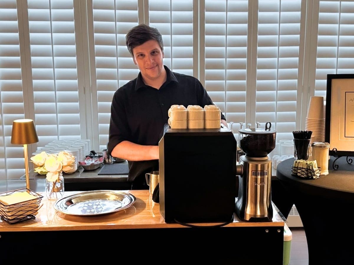 Barista at the espresso cart during a Bay Village event