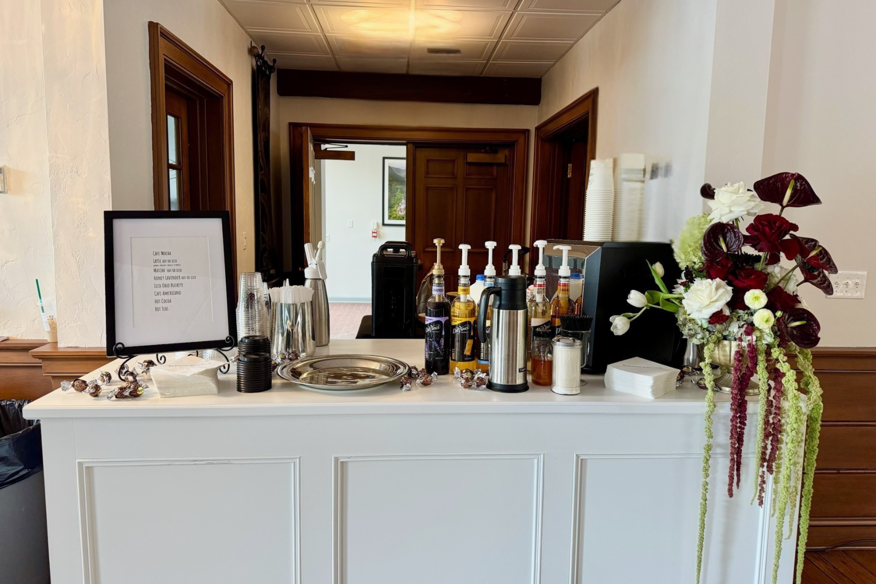Coffee bar styled with flowers for a wedding in Rocky River, Ohio