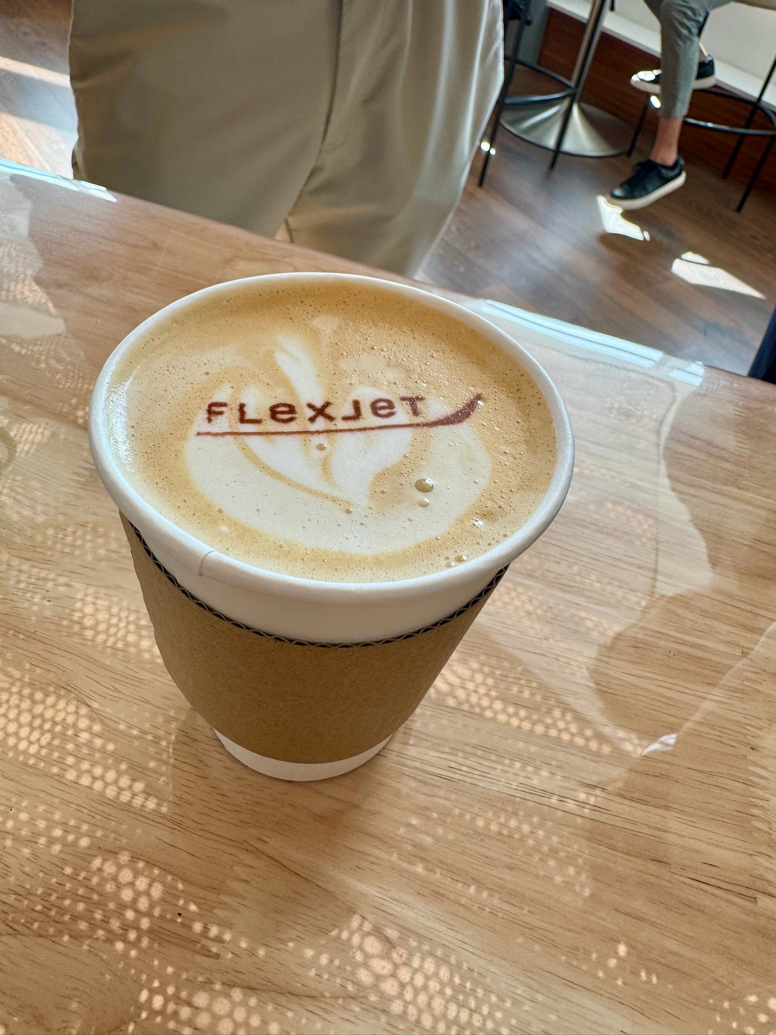 Logo printer adding company branding to lattes at a Cleveland corporate event